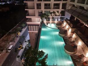 an overhead view of a swimming pool in a building at Blue View Apec Tuy Hoa in Tuy Hoa