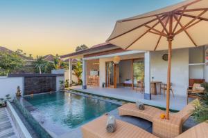 an image of a villa with a swimming pool at Rupa Arya Villa in Ubud