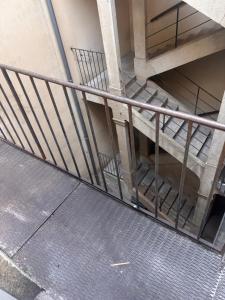 an overhead view of a staircase in a building at Maison Léon in Dole