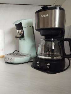 a coffee maker sitting on top of a counter at Vakantiehuis 't Leideveld in Maarkedal