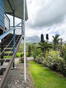 a staircase leading to a house with mountains in the background at Suite Palm in Palma