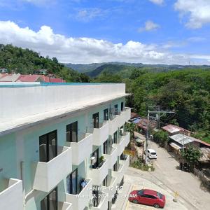 an apartment building with a view of a street at Thyme residences condominium, Unit 208 in Cebu