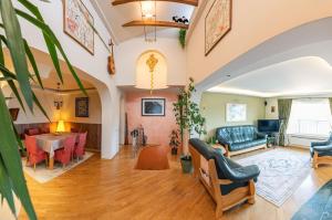 a living room with a table and a couch at House 46 in Veliko Tŭrnovo