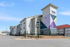 a rendering of the exterior of a hotel at Spark by Hilton Shawnee in Shawnee