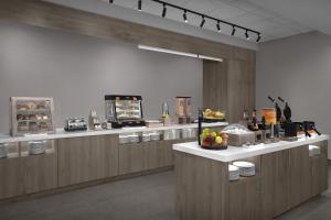 a kitchen with aasteryasteryasteryasteryasteryasteryasteryasteryasteryasteryasteryastery at Home2 Suites By Hilton Big Spring in Big Spring