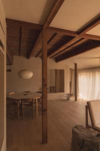 a dining room with a table and chairs at 蜜圡 Mitzdo in Tamano +21 photos