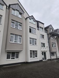 a group of buildings parked next to each other at Langenfeld City Apartment in Langenfeld