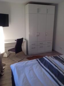 En eller flere senge i et værelse på Apartment Kleine Kremper