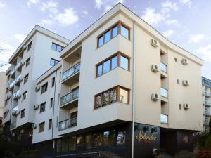 an image of a white apartment building at Apartments Villa Splendor in Vrnjačka Banja