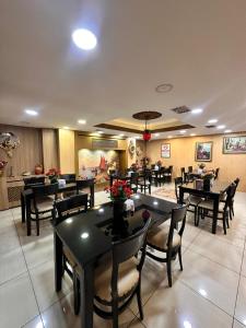 a dining room with tables and chairs in a restaurant at Efendi Hotel old town special category in Istanbul