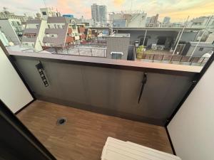 a balcony with a view of a city at Kyo-wa Hotel Oshiage in Tokyo +84 photos