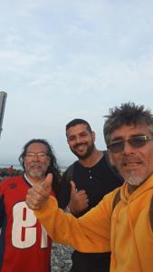a group of men posing for a picture at Hospedaje Casa Viru in Lima