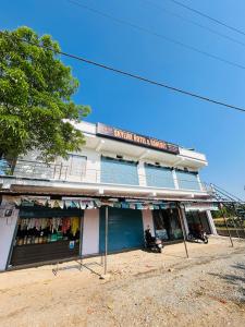 a building with a store on the side of it at Skyline Hotel & Banquet in Rewa