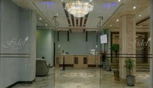 a lobby of a store with a chandelier at Fidel Hotel in Bahir Dar +12 photos
