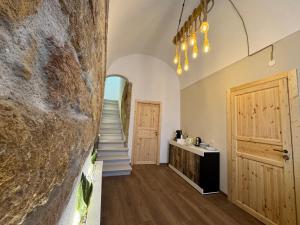a hallway with a staircase and a door and a room at Bella Gallery Terrasini in Terrasini