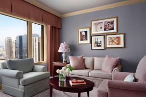 a living room with a couch and a table at The Ritz-Carlton Osaka in Osaka