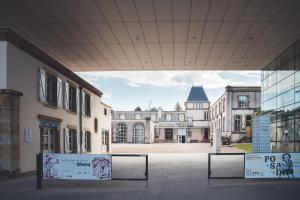 a view of an empty city with a building at Gîte Le Parigney, proche de la voie bleue in Igney +9 photos