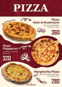 two pizzas sitting on top of avertisement at Holy Hostel Sathorn in Thung Maha Mek