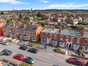an aerial view of a town with cars parked on a street at 5-Bed Family & Group Stay Near Cricket Ground in Worcester
