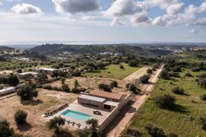 an aerial view of a house with a swimming pool at Villa Meti in Avola