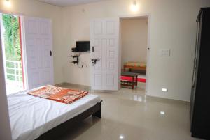 TV a/nebo společenská místnost v ubytování Vacanza Estate House