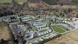 an aerial view of a park with cars and houses at Dulce Casa 34 2 bedroom with hot tub in Grantown on Spey