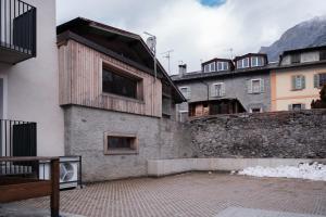 a building with a woodenkson at Casa Bepa in Bormio