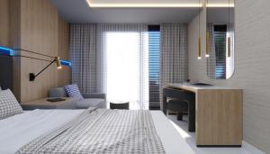 a bedroom with a bed and a desk and a desk at Almaris Resort Hotel - Ultra All Inclusive in Alanya