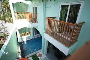 an overhead view of a house with two balconies at Green Resort Pondicherry in Pondicherry