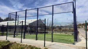 a batting cage in front of a soccer field at Camping Ezcaba in Maquirriain +1 photo