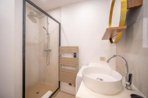 a bathroom with a sink and a shower at 6P apartment in a Citadelle with POOL - Saint-Tropez in Saint-Tropez