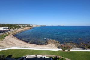 an aerial view of a beach and the ocean at Can Salia 4 Stars Sup in San Antonio Bay