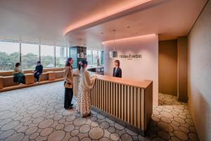 a rendering of the lobby of the malcolm hotel at THE TSUBAKIMORI Hotel & Residence in Chiba