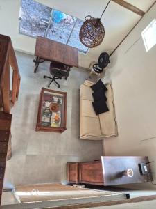 a room with a camera and other items on the wall at Casa Gringa in Cavalcante