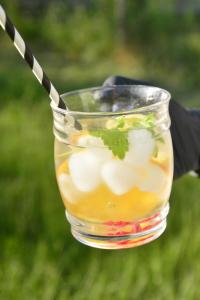 a drink in a glass jar with a stick in it at Klarysewo bliżej Słońca in Mrągowo +21 photos