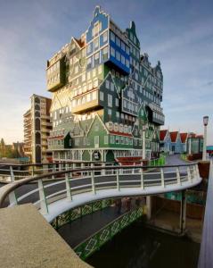 a building on a bridge over a river at Guesthouse Czaar Peter in Zaandam