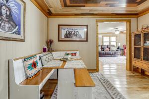 a living room with a table and a couch at Quaint Mountain Charm! Robbinsville Hideaway in Robbinsville