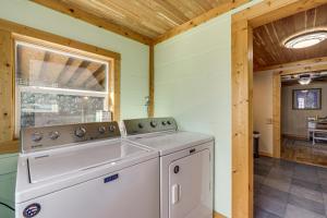 a washer and dryer in a room with a window at Quaint Mountain Charm! Robbinsville Hideaway in Robbinsville +30 photos