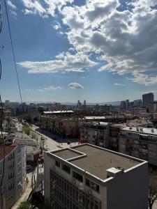 a view of a city from the top of a building at Prishtina Center Apartment, 100m from Skanderbeg Square in Prishtinë