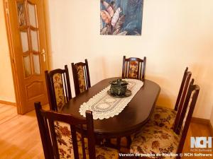 a dining room table with chairs and a bowl on it at Amapola 1 in Soria