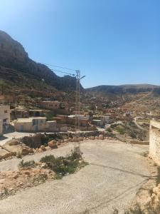a view of a town with mountains in the background at Diar twins in Gabès