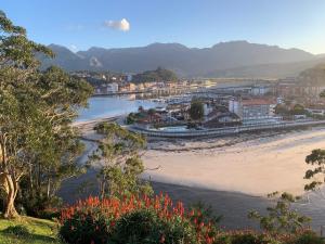 a view of a beach with a city and a river at Atalaya 5 - VUT5463AS in Ribadesella