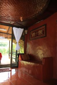 Posezení v ubytování Ban Din Resort Chiang Rai