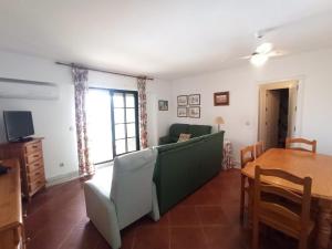 a living room with a couch and a table at ALCAUDÓN By SIT ISLA CANELA -REF 282- in Ayamonte
