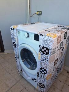 a washing machine is wrapped in a box at Campania Home in Terni