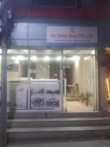 a store front of a building with the door open at De Hotel Veda Pvt Ltd in Thapathali