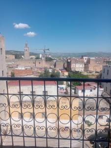 a view of a city from a balcony at Esc 3 in Fez