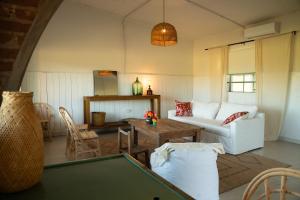 a living room with a pool table and a couch at Casa Cosmos in Colonia Ayui