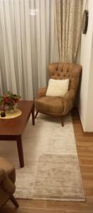 a living room with a couch and a coffee table at Ruza Vetrova a4 in Nova Varoš