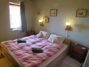 Tempat tidur dalam kamar di Nicoláj Vendégház és Tanya